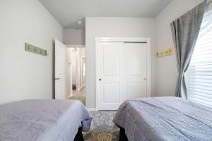 Postel nebo postele na pokoji v ubytování Travelers Hideout #2