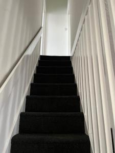 a flight of stairs in a building at East Street in Kent