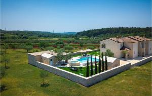 an aerial view of a house with a swimming pool at Villa Piccolo Paradiso in Rovinj +53 photos