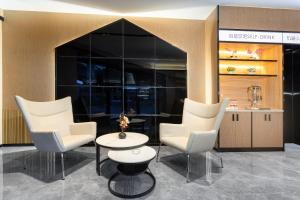 Area soggiorno di Guangzhou Yilin Hotel - Xiaogang metro Store
