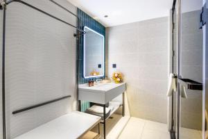Letto o letti in una camera di Guangzhou Yilin Hotel - Xiaogang metro Store