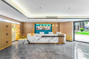 Area soggiorno di Guangzhou Yilin Hotel - Xiaogang metro Store