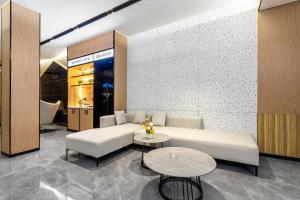 Area soggiorno di Guangzhou Yilin Hotel - Xiaogang metro Store