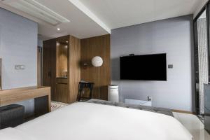 TV a/nebo společenská místnost v ubytování Western Grace Hotel Incheon