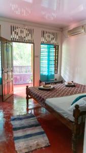 Giường trong phòng chung tại Soul Home Stay