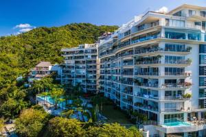 a large apartment building with a resort at Amapas ocean view condo in Puerto Vallarta