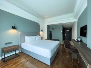 Postel nebo postele na pokoji v ubytování Hotel Seri Costa