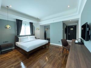 Postel nebo postele na pokoji v ubytování Hotel Seri Costa