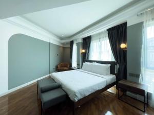 Postel nebo postele na pokoji v ubytování Hotel Seri Costa