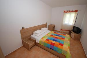 Postel nebo postele na pokoji v ubytování Springs Apartments & Rooms