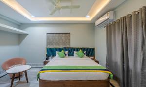 Voodi või voodid majutusasutuse Itsy Hotels Greenland Jungle View toas