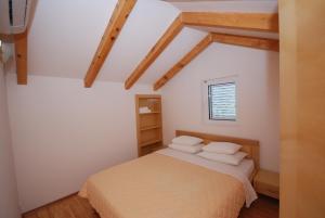 Postel nebo postele na pokoji v ubytování Springs Apartments & Rooms