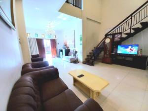 Khu vực ghế ngồi tại Homestay Jogja dekat Malioboro by Simply Homy