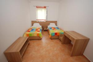 Postel nebo postele na pokoji v ubytování Springs Apartments & Rooms