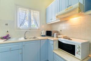 Kuchyň nebo kuchyňský kout v ubytování Angelina Apartment + 12 fotografií