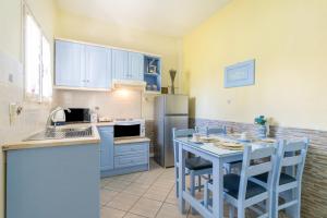 Kuchyň nebo kuchyňský kout v ubytování Angelina Apartment