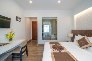 Katil atau katil-katil dalam bilik di Minh Chien Hotel