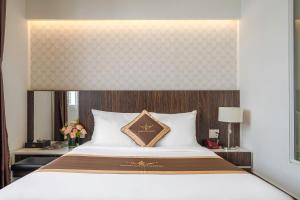 Katil atau katil-katil dalam bilik di Minh Chien Hotel