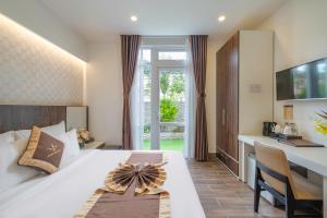 Katil atau katil-katil dalam bilik di Minh Chien Hotel