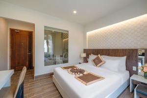 Katil atau katil-katil dalam bilik di Minh Chien Hotel