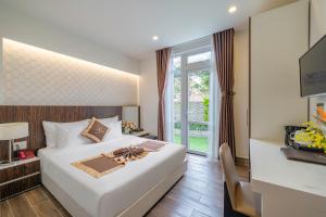 Katil atau katil-katil dalam bilik di Minh Chien Hotel