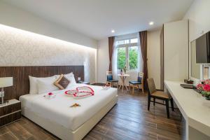 Katil atau katil-katil dalam bilik di Minh Chien Hotel