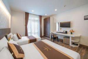 Katil atau katil-katil dalam bilik di Minh Chien Hotel