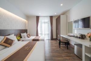 Katil atau katil-katil dalam bilik di Minh Chien Hotel