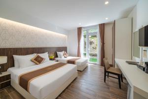 Katil atau katil-katil dalam bilik di Minh Chien Hotel