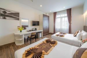 Katil atau katil-katil dalam bilik di Minh Chien Hotel
