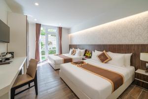 Katil atau katil-katil dalam bilik di Minh Chien Hotel
