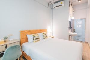 Postel nebo postele na pokoji v ubytování Latima Boutique Hostel