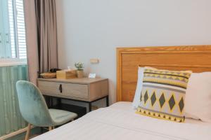 Postel nebo postele na pokoji v ubytování Latima Boutique Hostel