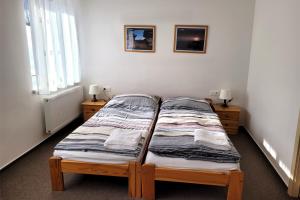 Postel nebo postele na pokoji v ubytování Chalupa Chiranka