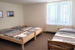 Postel nebo postele na pokoji v ubytování Chalupa Chiranka