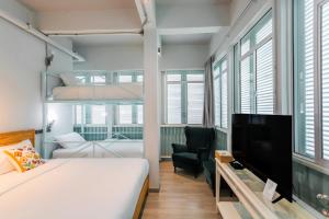 Postel nebo postele na pokoji v ubytování Latima Boutique Hostel
