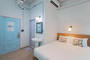 Postel nebo postele na pokoji v ubytování Latima Boutique Hostel