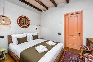 Rúm í herbergi á Hameau Mukhrani