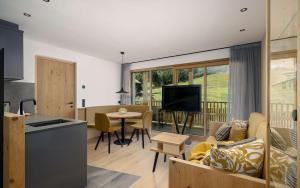 TV a/nebo společenská místnost v ubytování Tschitthof Wohnung Andl + 7 fotografií