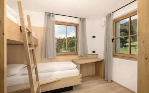 Krevet ili kreveti u jedinici u okviru objekta Tschitthof Wohnung Andl