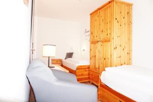 Łóżko lub łóżka w pokoju w obiekcie Ferienwohnung Aignerhof