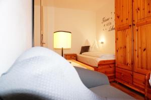 Łóżko lub łóżka w pokoju w obiekcie Ferienwohnung Aignerhof