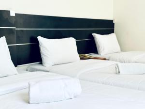 Letto o letti in una camera di Asphodel Inn