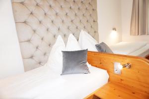 Łóżko lub łóżka w pokoju w obiekcie Ferienwohnung Aignerhof