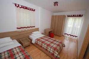 Postel nebo postele na pokoji v ubytování Springs Apartments & Rooms