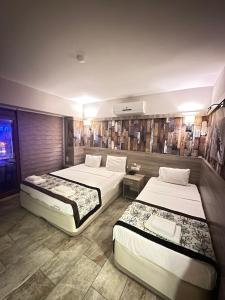 Postel nebo postele na pokoji v ubytování Street61 Apart Hotel