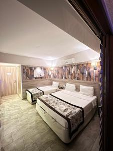 Postel nebo postele na pokoji v ubytování Street61 Apart Hotel + 37 fotografií
