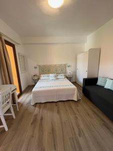 Postel nebo postele na pokoji v ubytování CASA FANNI- rooms