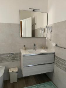 Koupelna v ubytování CASA FANNI- rooms