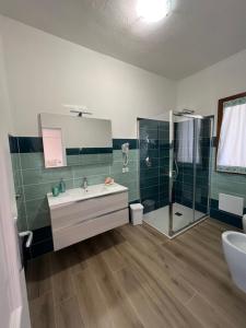 Koupelna v ubytování CASA FANNI- rooms